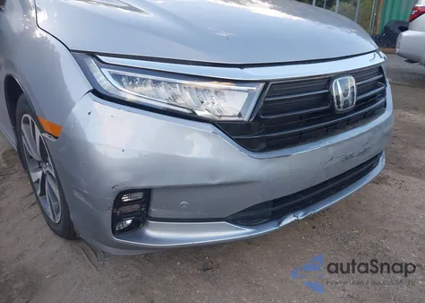 2021 Honda Odyssey Touring from USA, damaged, VIN 5FNRL6H87MB009491